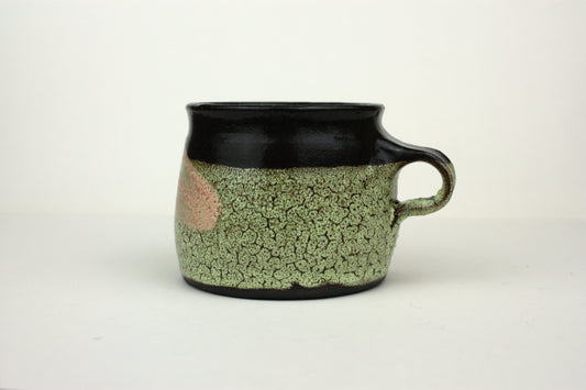 Green crawl glaze mug with pink detail