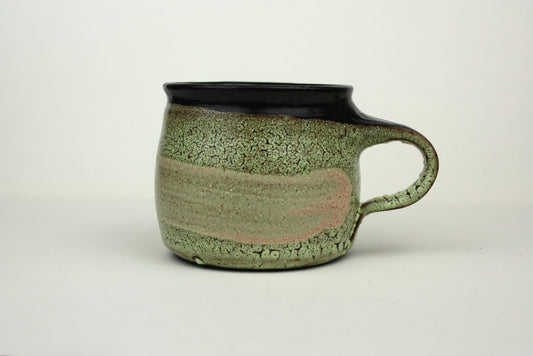 Green crawl glaze mug with pink detail